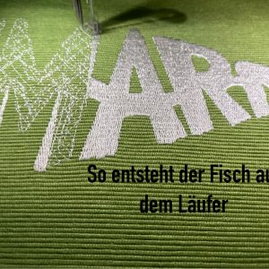 Läufer mit Fisch „unterm Arm“
